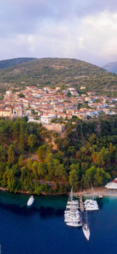 Spartochori village harbour aerial Meganisi Greece web crop3