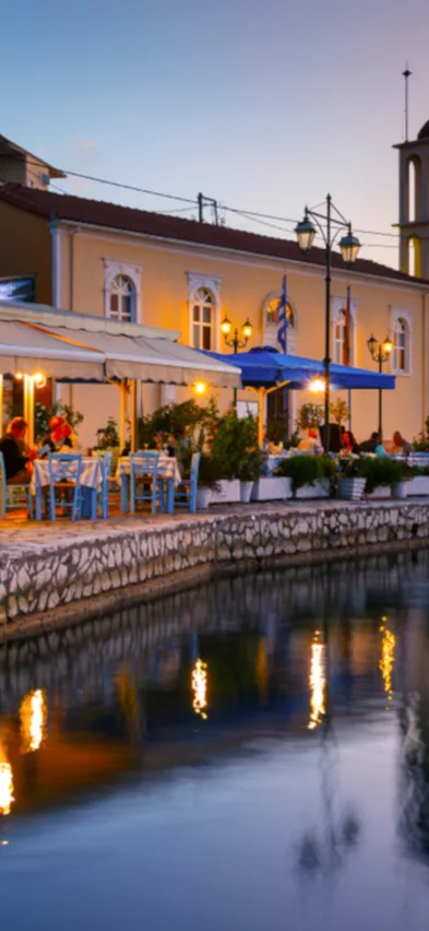 Vathi harbour taverna evening Meganisi Greece web